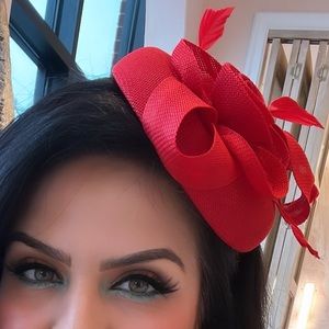 red fascinator hat